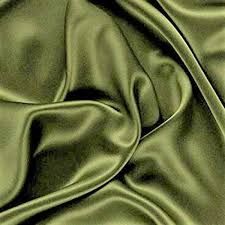 a close up view of a green satin fabric with very thin lines on it's surface