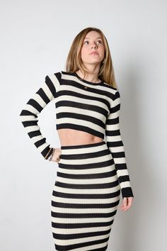 Make a statement with our Spare Top! This chic black and cream striped top is designed to fit perfectly, with long sleeves and a cropped fit. Wear on its own, or pair with our Spare skirt for a matching look that's sure to make heads turn! Materials: 89% Viscose and 11% Nylon All sale items are considered final sale. Striped Long Sleeve Crop Top For Fall, Chic Striped Cropped Crop Top, Chic Striped Cropped Top, Striped Long Sleeve Cropped Sweater For Spring, Crop Top And Skirt, Adhesive Bra, Striped Crop Top, Black And Cream, Hat Hairstyles