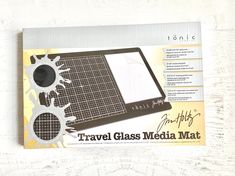 the back side of a travel glass media mat