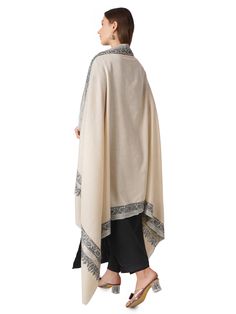 Step into luxurious warmth with our Cozy Pashmina Shawl, meticulously crafted from pure Kashmiri pashmina. This shawl not only enhances your comfort but also elevates your style with its timeless appeal. Product Details: Hand Embroidered Pure Kashmiri Pashmina Shawl Material: 100% Cashmere Size: 100 cm X 203 cm / 40 Inch X 80 Inch / 1.1 x 2.2 Yards (Approx) Base Color: (Specify color if applicable) Embroidery: Delicate and detailed border embroidery Sourced From: Changthangi goats in the Himalay Luxury Cream Pashmina Shawl, Luxury White Jamawar Shawl, Luxury Pashmina Shawl With Embroidered Border, Kashmiri Pashmina Shawl, White Pashmina, Border Embroidery, Wool Wrap, Pashmina Shawl, Cashmere Scarf