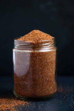 Brisket rub in a glass jar without a top and some of it spilled over the side on a black table. Best Brisket Rub, Smoked Brisket Rub, Beef Plate Ribs, Brisket Rub Recipe, Best Brisket, Brisket Seasoning, Homemade Chorizo, Smoked Chuck Roast, Chimichurri Sauce Recipe