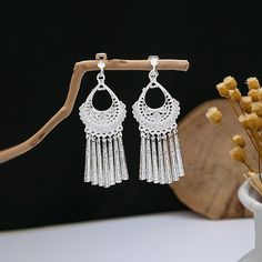 Material: Alloy Fashion Element: Circle, Triangle, Ellipse Style: Ethnic Style Silver Fringe Metal Earrings, Silver Fringe Drop Earrings, Silver Fringe Chandelier Drop Earrings, Silver Metal Chandelier Earrings With Tassels, Silver Dangle Tassel Earrings With Fringe, Silver Dangle Earrings With Tassels, Silver Dangle Tassel Earrings, Silver Fringe Bohemian Earrings, Silver Bohemian Tassel Earrings With Fringe