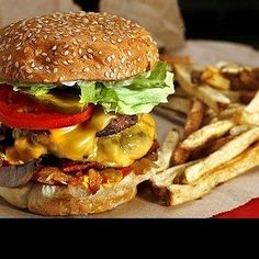 a hamburger and french fries on a plate