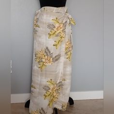 Tommy Bahama Women's Wrap Skirt Side Tie. Matching Tank Sold Separately. Beach Season Yellow Vacation Skirt, Beige Floral Print Skirt For Vacation, Yellow Long Skirt For Vacation, Yellow Flowy Skirt For Beach, Beige Floral Print Bottoms For The Beach, Summer Yellow Long Wrap Skirt, Yellow Long Skirt For The Beach, Yellow Long Skirt For Beach, Yellow Summer Beach Skirt