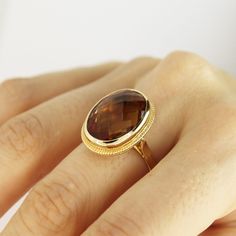 Color Changing Oval Zultanite Ring 14k Solid Gold Real Sultanite Ring Wedding Band Vintage Style Jewelry Christmas Gift For Women Anniversary ▶ 𝙋𝙍𝙊𝘿𝙐𝘾𝙏 𝙁𝙀𝘼𝙏𝙐𝙍𝙀𝙎 * 14k Solid Gold Ring * Zultanite Gemstone Ring Width: 1.50 cm ( 0.59 inches) * Zultanite Gemstone Ring Lenght: 2 cm ( 0.78 inches) * Zultanite Gemstone Ring Height: 8 mm ( 0.31 inches) - Our Zultanite ring is real and natural stone. You can tell from the color change that it is original. It is not lab made. Zultanite ston Classic Oval Gemstones For Wedding, Oval Faceted Rings In Fine Jewelry Style, Oval Faceted Sapphire Ring Fine Jewelry, Oval Diamond Cut Topaz Ring For Anniversary, Oval Diamond Cut Topaz Anniversary Ring, Wedding Oval Amethyst Ring In 14k Gold, Elegant Oval Cabochon Wedding Gemstones, Gold Oval Faceted Ring, Elegant Faceted Birthstone Ring In 14k Gold