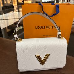 Mm Twist White Louis Vuitton Handbag With Optional Chain. Less Than 1 Year Old, Great Condition Louis Vuitton Mm, White Louis Vuitton, Louis Vuitton Handbag, Louis Vuitton Bags, Louis Vuitton Handbags, Handbags On Sale, Louis Vuitton Bag, 1 Year, Year Old