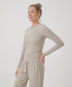 What's cooler than being cool? The Cool Stretch collection. Made with breathable organic cotton and just enough flex for layering, lazing, and living in Slim stretch-fit body Crew neckline, long sleeves Extended length, straight hem Made with organic cotton in a Fair Trade certified factory Basic Relaxed Fit Tops For Lounging, Casual Comfortable Long Sleeve Tops, Beige Long Sleeve Top For Loungewear, Spring Beige Loungewear Activewear, Organic Cotton Long Sleeve Tops For Loungewear, Comfortable Long Sleeve Tops For Loungewear, Comfortable Fitted Tops For Fall, Comfortable Fitted Long Sleeve Tops, Cotton Tops For Relaxation In Fall