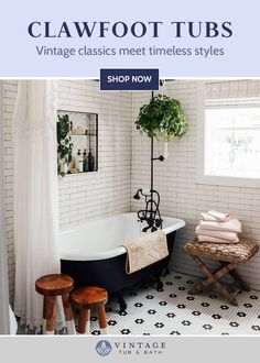 a black and white bathtub in a bathroom with two stools next to it