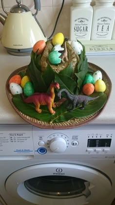 a dish that is sitting on top of a washing machine