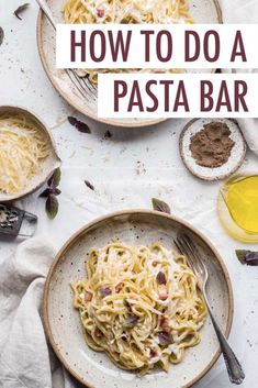 a white plate topped with pasta next to a glass of olive oil and a fork