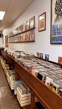 there are many records on the shelves in this room and one is full of them