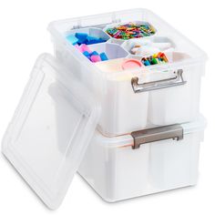 two plastic storage containers filled with craft supplies