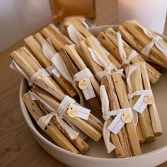 some sticks are tied up and placed on a plate