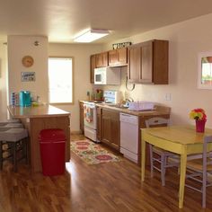 the kitchen is clean and ready to be used for cooking, dining or as a family room