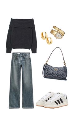 a black sweater, jeans and white shoes are arranged in the shape of a woman's outfit