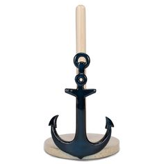 an anchor with a candle holder is shown on a white background, and it has a wooden stick sticking out of the top