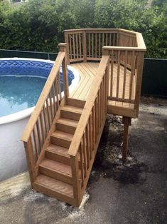 an above ground pool with steps leading up to it