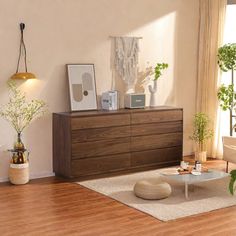 a living room scene with focus on the dresser and coffee table in the center area