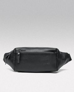 Refine Your Look with the Leather Fanny Pack Crossbody "Arao" For those who value elegance and utility, the Leather Fanny Pack Crossbody "Arao" is the ideal accessory. Crafted from premium leather, this sleek and functional fanny pack adds a touch of sophistication to your everyday style while offering practical features for modern living. Whether you're running errands or exploring the city, the "Arao" ensures that your essentials are kept secure and easily accessible. Timeless Design, Modern Functionality The "Arao" stands out with its sleek leather construction, designed to elevate any outfit. The rich texture of the leather gives it a luxurious feel, while its minimalist design keeps it versatile for both casual and more formal occasions. With its compact yet spacious main compartment, Cyberpunk Pants, Cyberpunk Helmet, Hakama Pants, Techwear Pants, Techwear Outfits, Streetwear Pants, Leather Fanny Pack, Rich Textures, Chest Bag