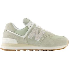 This shoe offers a uniquely versatile mix of new, different, uncomplicated, rugged, durable, and comfortable. The New Balance WL574 is a casual women's lifestyle shoe built to be a reliable shoe that could do a lot of different things well. These New Balance WL574QD2 Olivine/Moon Beam Suede Women's Shoes have the following features: Suede/mesh upper The vamp, collar, and tongue mesh are 100% recycled polyester ENCAP midsole cushioning combines soft foam with a durable polyurethane rim to deliver New Balance Wl574, New Balance Shoe, Green Shoe, Suede Shoes Women, Athleisure Sneakers, Ocean Design, Everyday Shoes, New Balance Women, Fresh Kicks