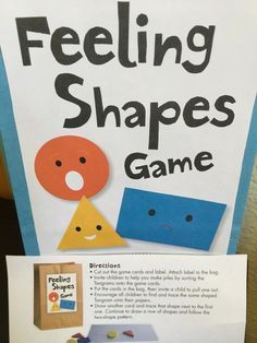 a sign that says feeling shapes game with pictures of different shapes and sizes on it