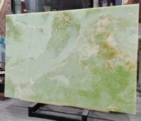 a large marble slab sitting on top of a metal stand