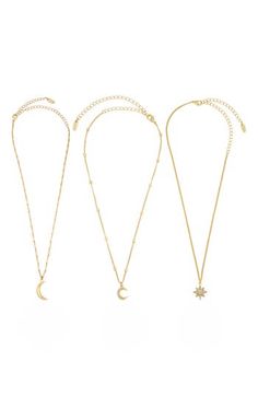 Bring a touch of celestial sparkle to your look with this set of three pendant necklaces perfect for layering together or wearing separately. Set of three necklaces 14" to 16" length; 5" extenders 3/8", 1/2" moon & star diameters, large moon 7/8" drop, 1/4" width Lobster clasp closures 18k-gold plate/glass Imported Adjustable Delicate Celestial Chain Necklace, Celestial Pendant, Three Necklaces, Moon Star, Stars And Moon, Pendant Necklaces, Womens Jewelry Necklace, Lobster Clasp, Layering