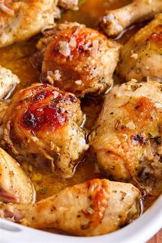 closeup of chicken thighs in a white dish