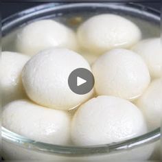 a glass bowl filled with white balls of food