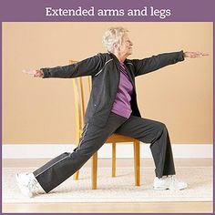 an elderly woman sitting on a chair with her arms stretched out and legs spread wide