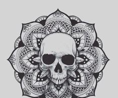 a black and white drawing of a skull in a flower design on a white background