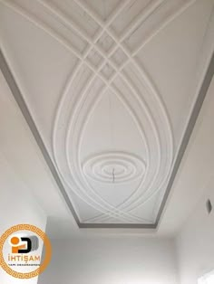 the ceiling is white and has an intricate design on it