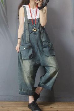 #jeans #overalls #dungarees #relaxfit Casual Cargo Jeans Overalls, Utility Denim Jumpsuit With Pockets For Fall, Casual Denim Cargo Jumpsuit, Casual Denim Cargo Style Jumpsuit, Utility Overalls With Side Pockets And Loose Fit, Utility Dark Wash Denim Jumpsuit With Pockets, Baggy Utility Overalls With Side Pockets, Vintage Jeans With Cargo Pockets, Baggy Blue Overalls With Pockets