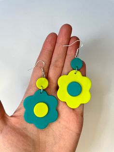 These earrings are made from premium polymer clay. They are made with sterling silver hooks. Adjustable Polymer Clay Flower Earrings, Flower-shaped Polymer Clay Earrings With Ear Wire, Flower Shaped Polymer Clay Earrings With Ear Wire, Multicolor Flower Polymer Clay Earrings, Hand Painted Flower Polymer Clay Earrings, Yellow Flower-shaped Polymer Clay Earrings, Hand Painted Green Flower Earrings, Green Hand Painted Flower Earrings, Nickel-free Flower-shaped Polymer Clay Earrings