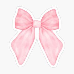 a pink bow sticker sitting on top of a white surface with watercolor effect