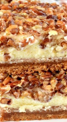 two pieces of cake sitting on top of a white plate