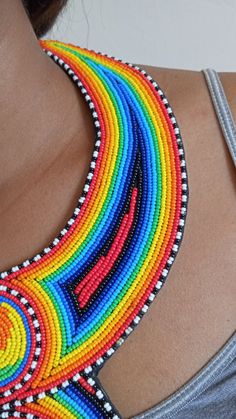 African wedding necklace, Zulu necklace, Beaded shawl necklace, African jewelry, Masai necklace, Bridesmaid necklace, Wedding gift This stunning necklace is superbly crafted with fine beads. The necklace can be worn with any outfit at different occasions and it will absolutely makes you stand out. 100% handmade using fine beads. Color: multicolored 3-5 days delivery via DHL Express The shipping fee is for the first item only and additional necklaces or items ship for free. Wholesale available at Wedding Multicolor Beaded Chain Beads, Bohemian Multicolor Beaded Necklaces For Wedding, Multicolor Beaded Chain Necklace For Wedding, Bohemian Multicolor Beaded Necklace For Wedding, Multicolor Beaded Necklace For Wedding, Multicolor Polished Round Beads Bridal Necklace, Multicolor Bridal Necklace With Polished Round Beads, Bridal Necklace With Colorful Round Beads, Multicolor Polished Beads Necklace For Wedding