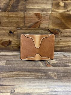 This is my Montana Western vertical wallet. My best seller it is shown in Chestnut and Tan 2 Toned. It measures 3.125 x 4.625 Closed Leather. Being a natural material, the shade of leather will vary with every wallet made. Brown Bifold Card Holder For Daily Use, Brown Trifold Wallet With Leather Patch For Everyday, Brown Leather Patch Trifold Wallet For Everyday, Everyday Brown Trifold Wallet With Leather Patch, Brown Trifold Card Holder For Daily Use, Artisan Brown Bifold Card Holder, Rustic Bifold Wallets For Everyday Use, Brown Leather Patch Trifold Wallet, Brown Trifold Wallet With Leather Patch