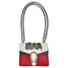 Introducing the Gucci Multicolor Leather Mini Crystal Snake Embroidered Dionysus Bag – a stunning fusion of artistry and luxury that makes an unforgettable statement. Crafted from red, white, and navy blue leather, this handbag is adorned with an eye-catching bead-embroidered snake, showcasing Gucci's iconic and distinctive design elements. The silver-tone snake motif on the closure adds a touch of mystique and elegance to the bag, while the adjustable chain strap allows for versatile styling op Embroidered Snake, Snake Motif, Chanel Boots, Gucci Mini, Versace Dress, Gucci Shoulder Bag, Leather Mini, Blue Leather, Individual Style