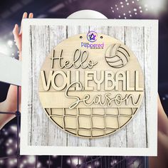 there is a sign that says hello volleyball season on the side of a wooden plaque