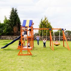 children are playing on the playground equipment