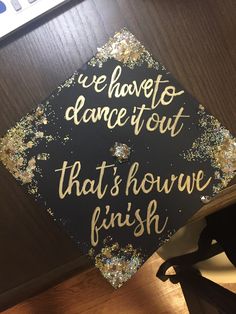 a graduation cap that says we have to dance out that's how we finish