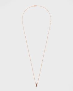 A soft line of rose gold, a sculpted brown PVD ring, two of the Quatre collection's signature codes forming a delicate pendant that only asks to be completed by its other half, as a romantic pact of love..Boucheron pendant necklace.18-karat yellow and pink gold.Brown PVD.Pendant length: 45 cm.Adjustable length.Lobster clasp.Wipe with a clean, dry cloth.Boucheron Style # JPN00648 About the Collection: Quatre collection: a graphic and strong design, to reveal every facets of women personalities. W Boucheron Jewelry, Rose Gold Brown, Delicate Pendant, Woman Personality, Yellow And Pink, Mini Pendant, Personalities, 18k Rose Gold, Free Jewelry