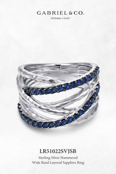 Go bold with a statement-making fashion ring that can enhance both everyday and evening looks. The wide band is comprised of multiple intertwining strands of hammered 925 sterling silver and intense blue sapphires for eye-catching texture and shine.
Sterling Silver Hammered Wide Band Layered Sapphire Ring
LR51022SVJSB Luxury Open Ring Sapphire For Anniversary, Gabriel Jewelry, Ladies Rings, White Gold Sapphire, Fashion Ring, Sapphire Jewelry, Hammered Silver, Open Ring, Wide Bands