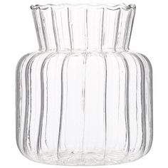 a clear glass vase sitting on top of a white table