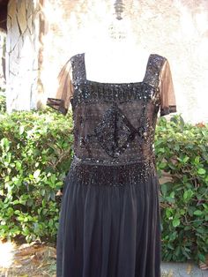 "Vintage 1930's Beaded Cropped Waist Length Top with Fitted attached under camisole and ribbon waistband.  The beaded Bodice has a square neckline and short sleeves, it is beaded in a floral pattern with a diamond center in black sequins and tiny jet  beads ending with 3\" beaded fringe hem.  I have restored all the loose beading on the bodice which took many hours, before offering for sale.  The bodice camisole has a separating zipper that was probably added a a later date I added an original 1 Vintage Silk Flapper Dress, 1920s Embellished Fitted Dress, Vintage Silk Flapper Dress Fitted, Vintage Silk Fitted Flapper Dress, 1920s Fitted Sequin Dress, 1920s Embellished Evening Dresses, 1920s Style Embellished Evening Dresses, Vintage Embellished Fitted Flapper Dress, Vintage Fitted Embellished Flapper Dress