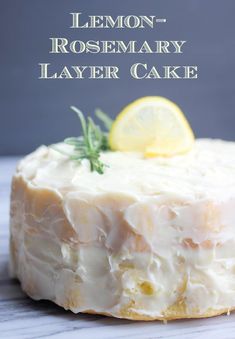 a lemon rosemary layer cake on a white marble surface with the words lemon - rosemary layer cake above it