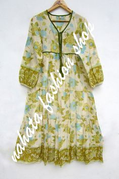 ITEM DESCRIPTION summer cotton flower printed long maxi dress - v neckline with tassel boho dress - long sleeve casual wear maxi   Features: Long sleeve, V neck, Long dress Fabric : 100% Cotton Voile screen printed fabrics  Sleeve Length = 22 inch For more sizes & their measurement, please refer our below chart to understand the sizes variations available with us For your size requirement, please mention your size in seller note at the time of buying. SIZE MEASUREMENT  BUSTLENGTHSHOULDER XXS34 inch51 inch13.5 inch XS36 inch51 inch14 inch S38 inch51 inch14.5 inch M40 inch51 inch15 inch L42 inch51 inch16 inch XL44 inch51 inch16.5 inch 2XL46 inch51 inch17 inch 3XL48 inch51 inch18 inch   Company Return Policy:  Please write for more information to my email directly CHOOSE "ASK SELLER QUESTION" Hippie Cotton V-neck Maxi Dress, Cotton V-neck Boho Hippie Dress, Spring Bohemian Boho Dress With Block Print, Spring Bohemian Boho Dress With Tassels, Cotton Floral Print Hippie Maxi Dress, Hippie Style Long Sleeve Cotton Maxi Dress, Green Bohemian Maxi Dress With Tassels, Hippie Boho Cotton V-neck Dress, Hippie Cotton Maxi Dress With V-neck