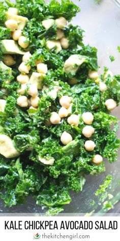 kale chickpea avocado salad in a glass bowl with the title above it