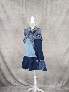 a dress made out of jeans on a mannequin